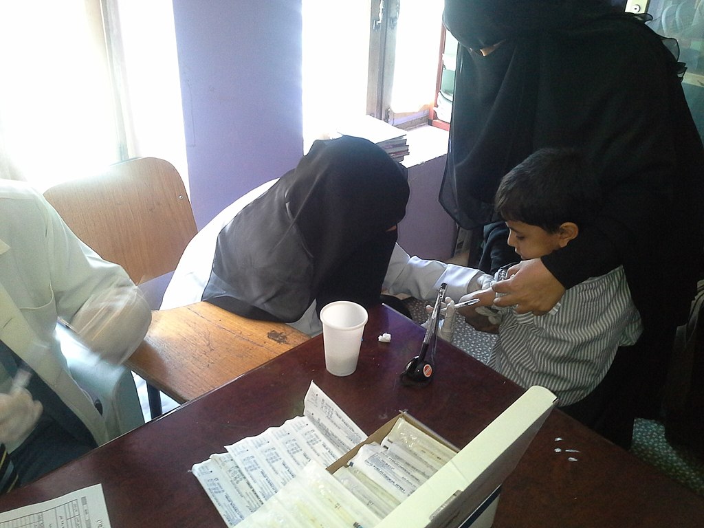 Photo of children in Yemen being vaccinated